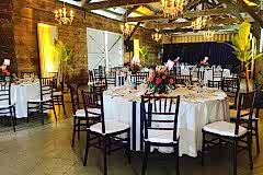 Inside with chandeliers and plants
